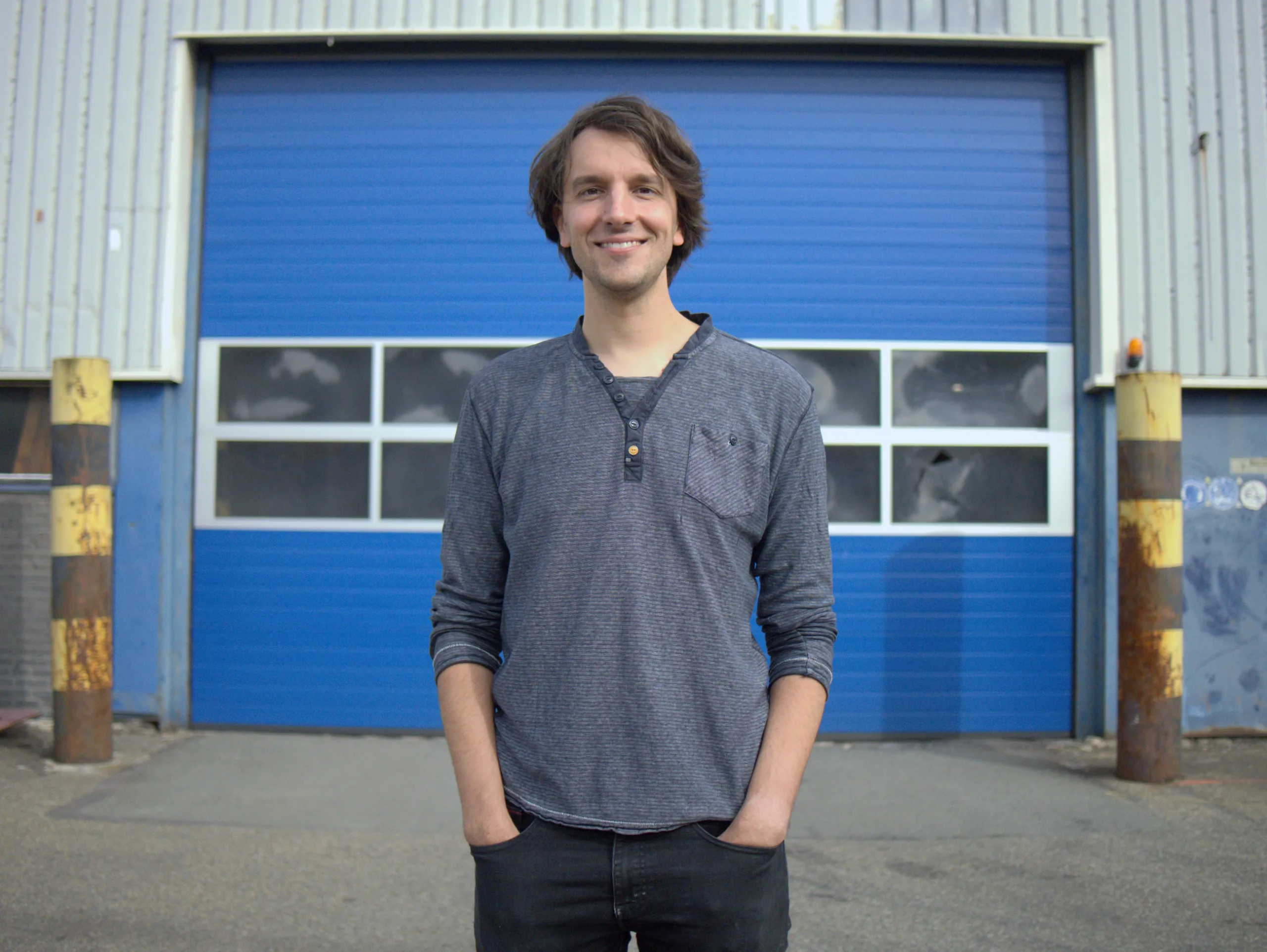 Portrait of Harry in front of the DEKC workshop door